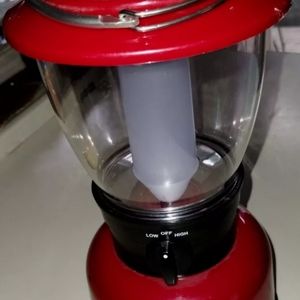 Red Coleman battery operated fluorescent lantern